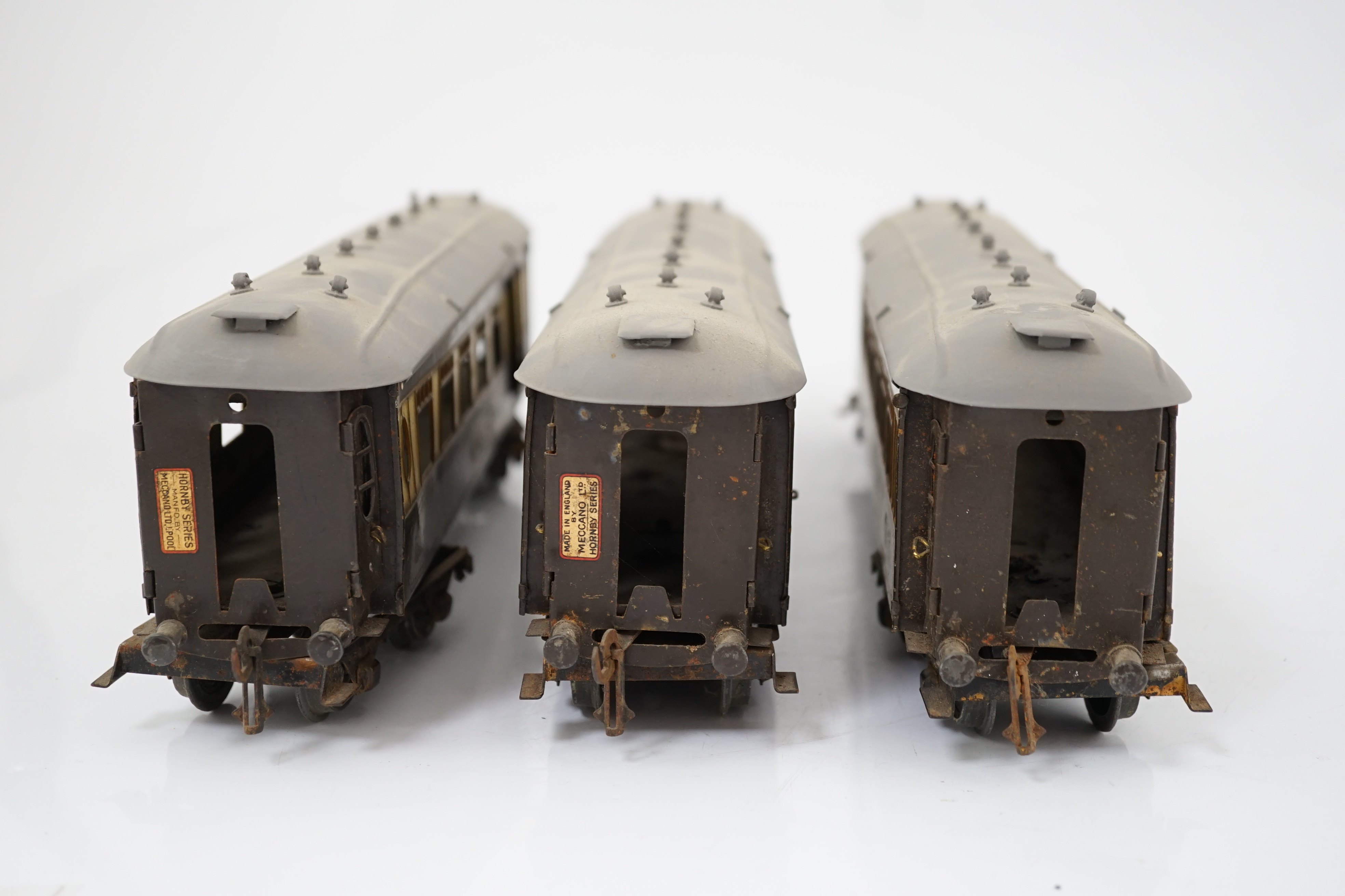 Three Hornby Series 0 gauge tinplate Pullman cars; Loraine, Arcadia and Montana